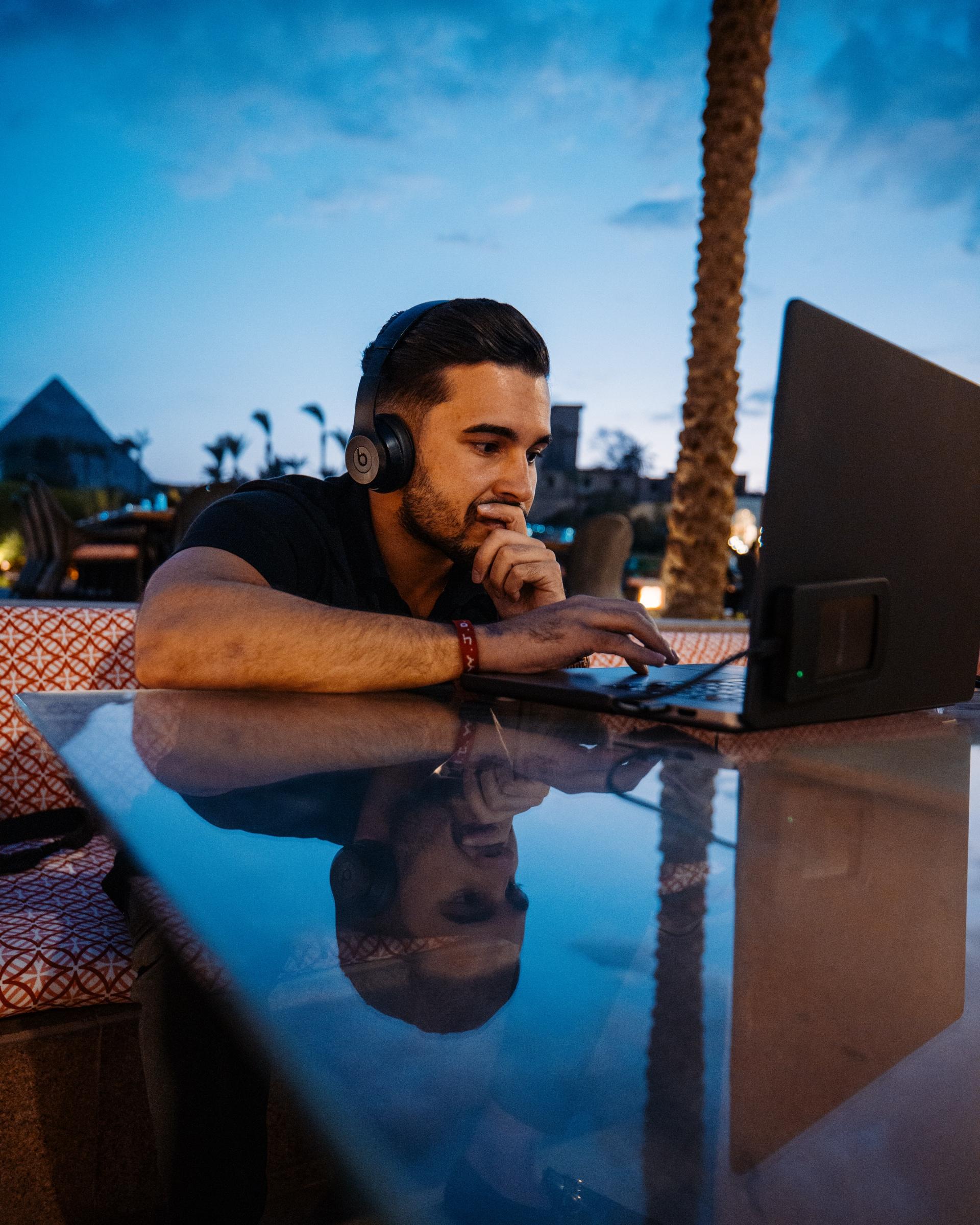 Jay Awal working at a laptop